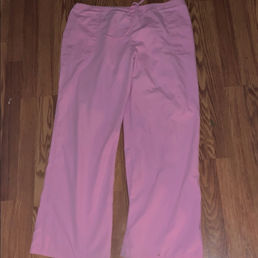 Pink scrub pants elastic waist and tie string.